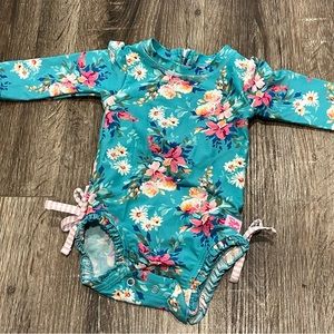 Rufflebutts Long Sleeve One Piece Rash Guard in Fancy Me Floral 3-6 months